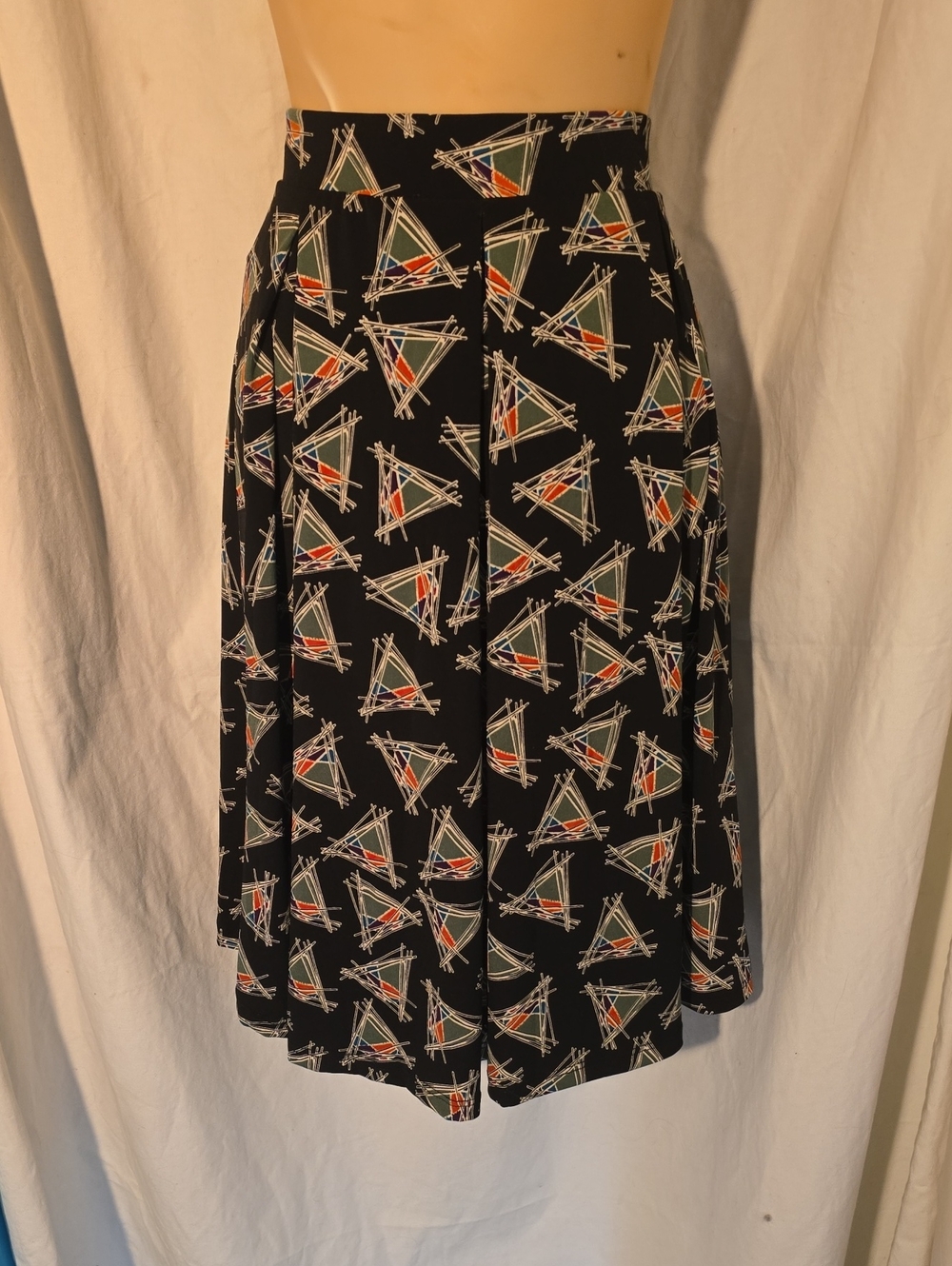 LuLaRoe Black A-Line Skirt with Orange and Green Geometric Motifs